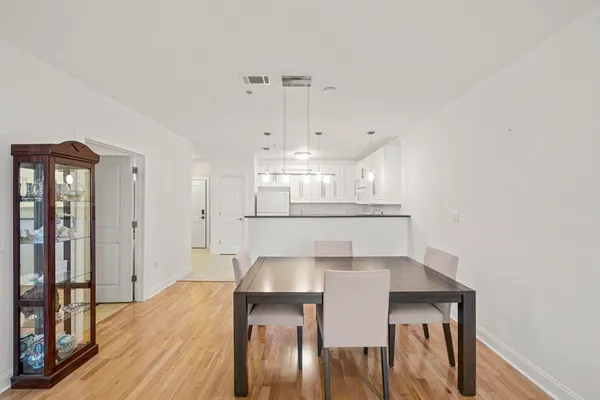 a view of a kitchen from the hallway