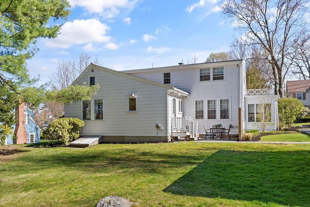 29 Kenwin Road Winchester, MA 01890 - Photo 31 of 35 a front view of a house with a yard