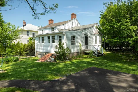 a house view with a garden space