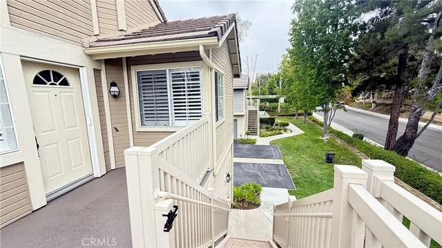 a view of a street from a balcony