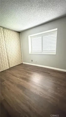 a bathroom with a double vanity sink and mirror