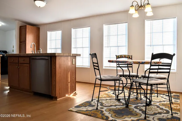 a bathroom with a vanity and a bathtub