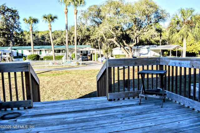 a bedroom with a bed and dresser