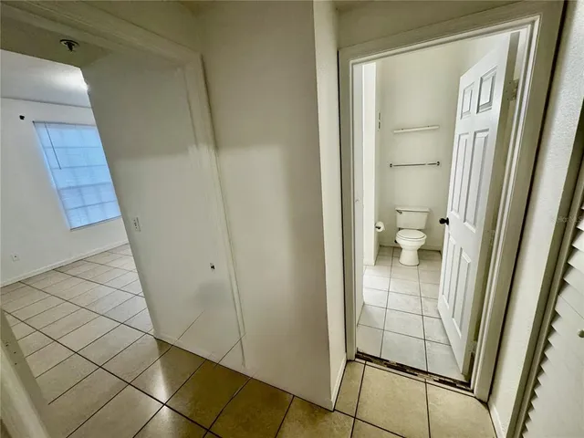a bathroom with a glass door shower and a sink