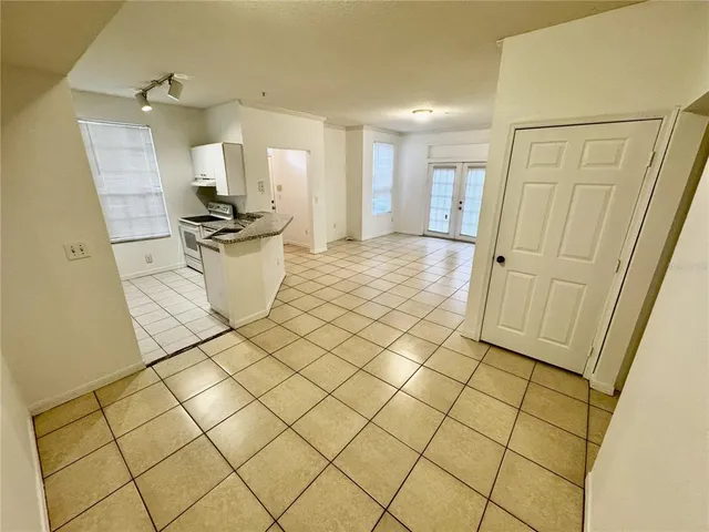 a view of a kitchen and utility room