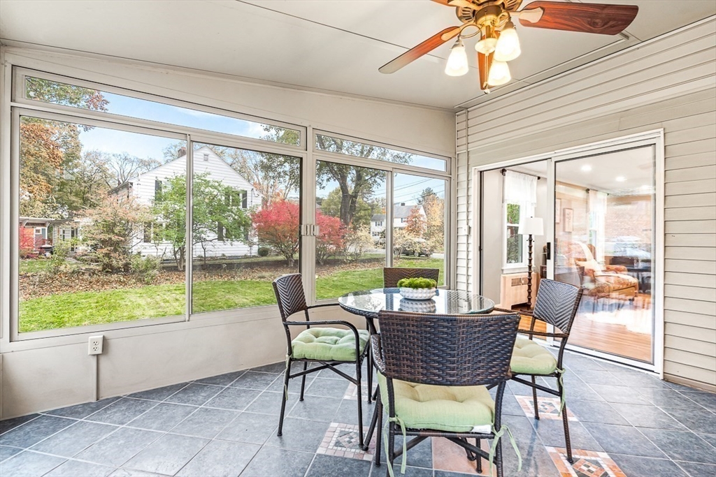 6 Marchant Road Winchester, MA 01890 - Photo 23 of 42 a view of a dining room with furniture window and outside view