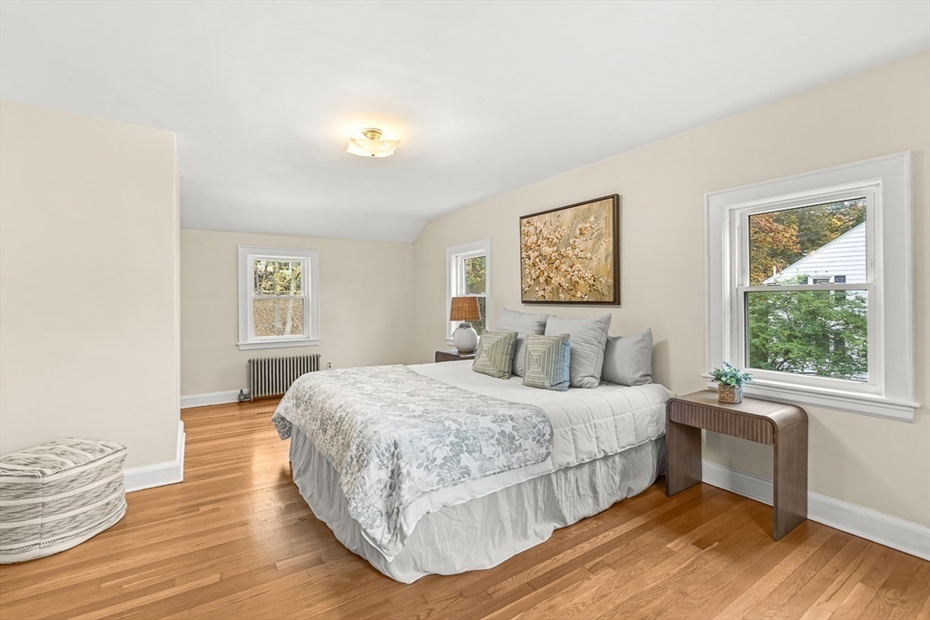 6 Marchant Road Winchester, MA 01890 - Photo 30 of 42 a bedroom with a bed and a window