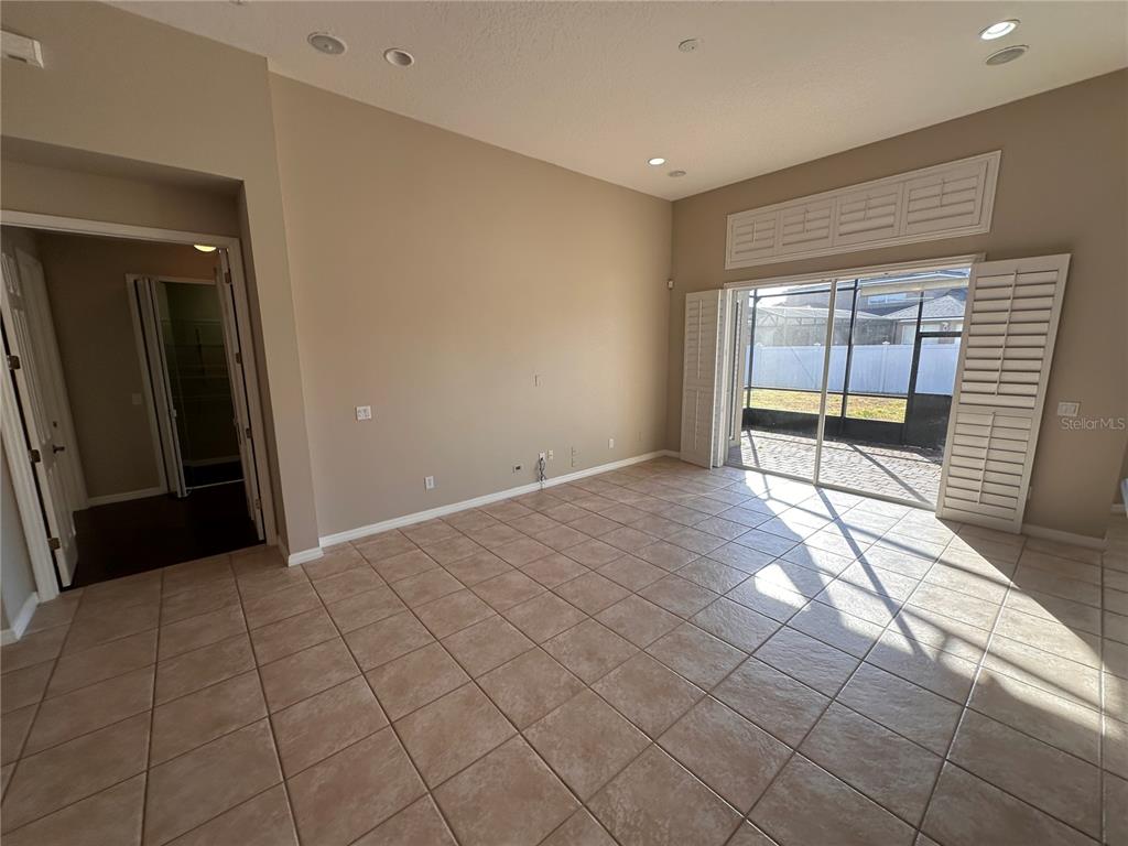 4962 Rock Rose Loop Sanford, FL 32771 - Photo 4 of 27 a view of an empty room and window