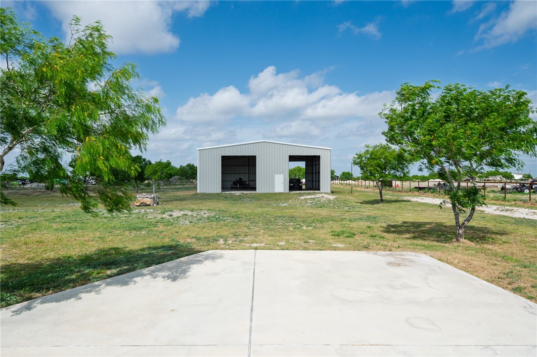 4331 Callicoatte Road Robstown, TX 78380 - Photo 29 of 40 a view of a house with a yard