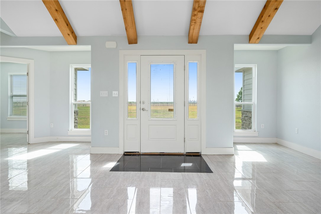 4331 Callicoatte Road Robstown, TX 78380 - Photo 3 of 40 a bathroom with a tub shower and sink