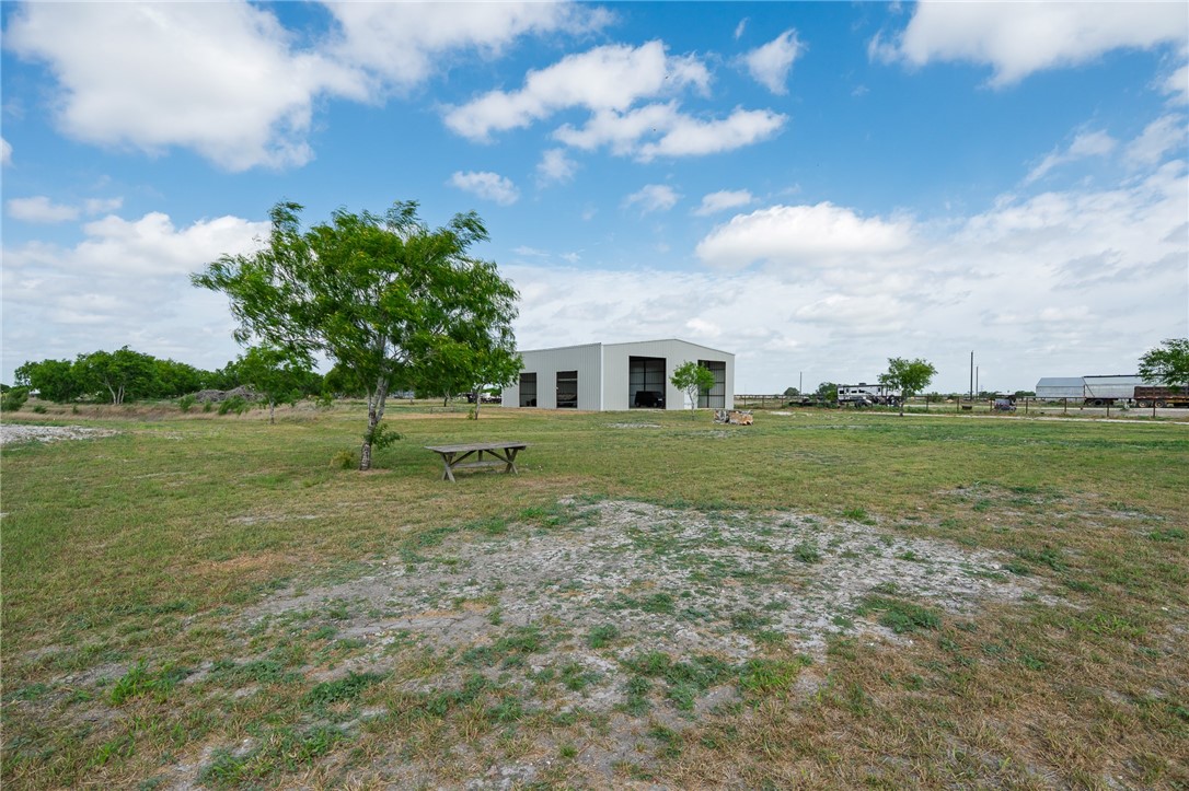 4331 Callicoatte Road Robstown, TX 78380 - Photo 32 of 40 a view of a house with a backyard