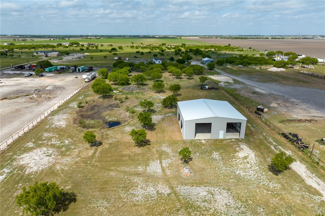 4331 Callicoatte Road Robstown, TX 78380 - Photo 39 of 40 an aerial view of a house with a yard