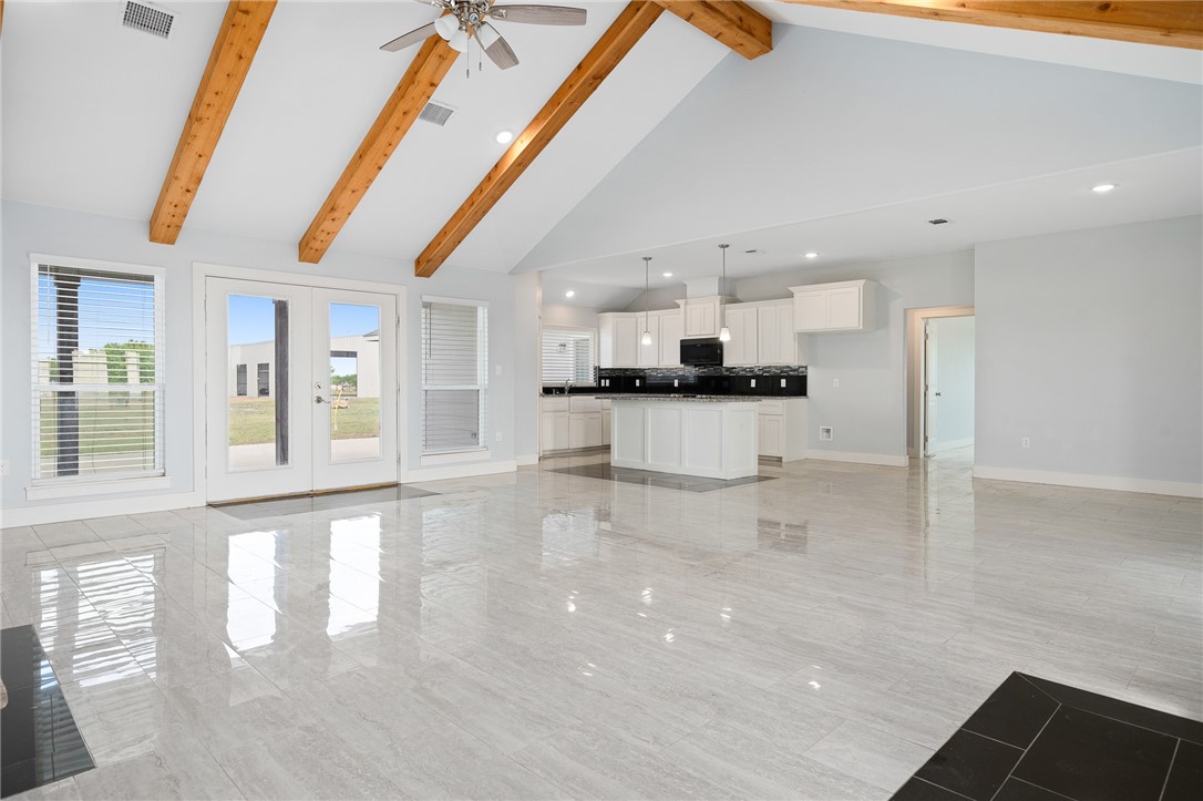 4331 Callicoatte Road Robstown, TX 78380 - Photo 4 of 40 a view of a kitchen with a sink and microwave