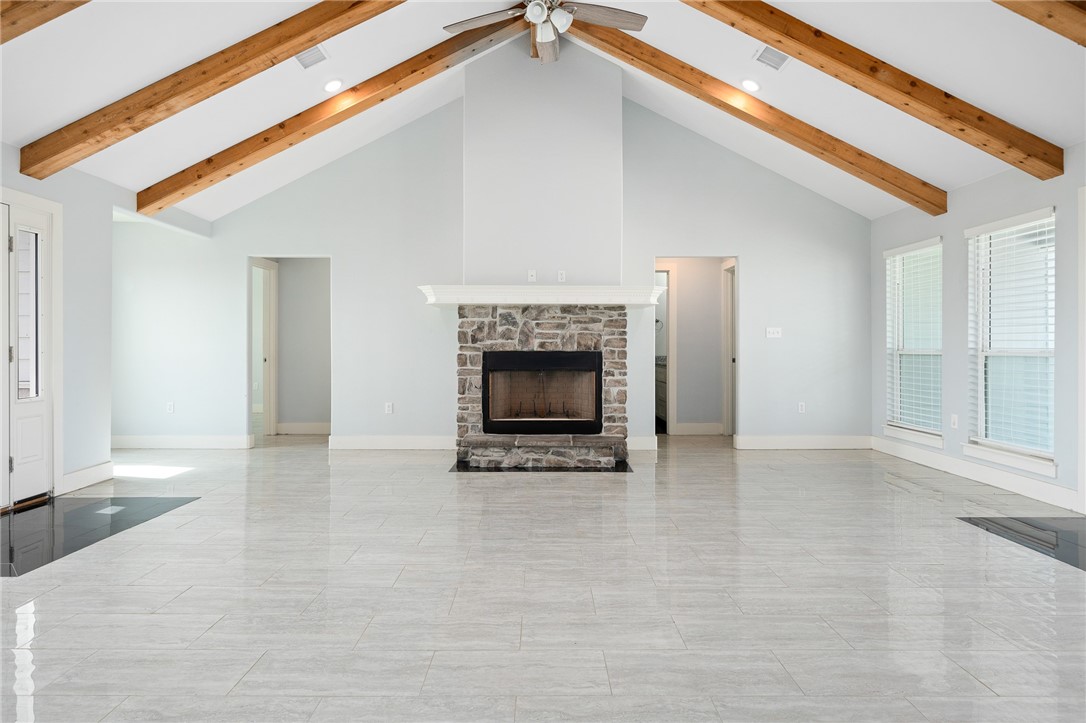 4331 Callicoatte Road Robstown, TX 78380 - Photo 6 of 40 a view of an empty room with a fireplace