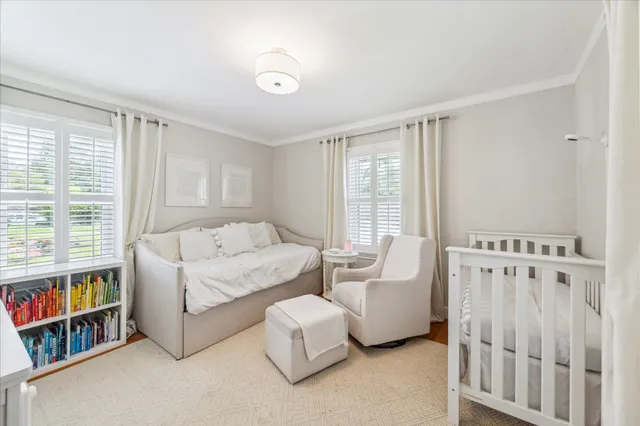 a large kitchen with stainless steel appliances granite countertop a lot of counter space and wooden floors