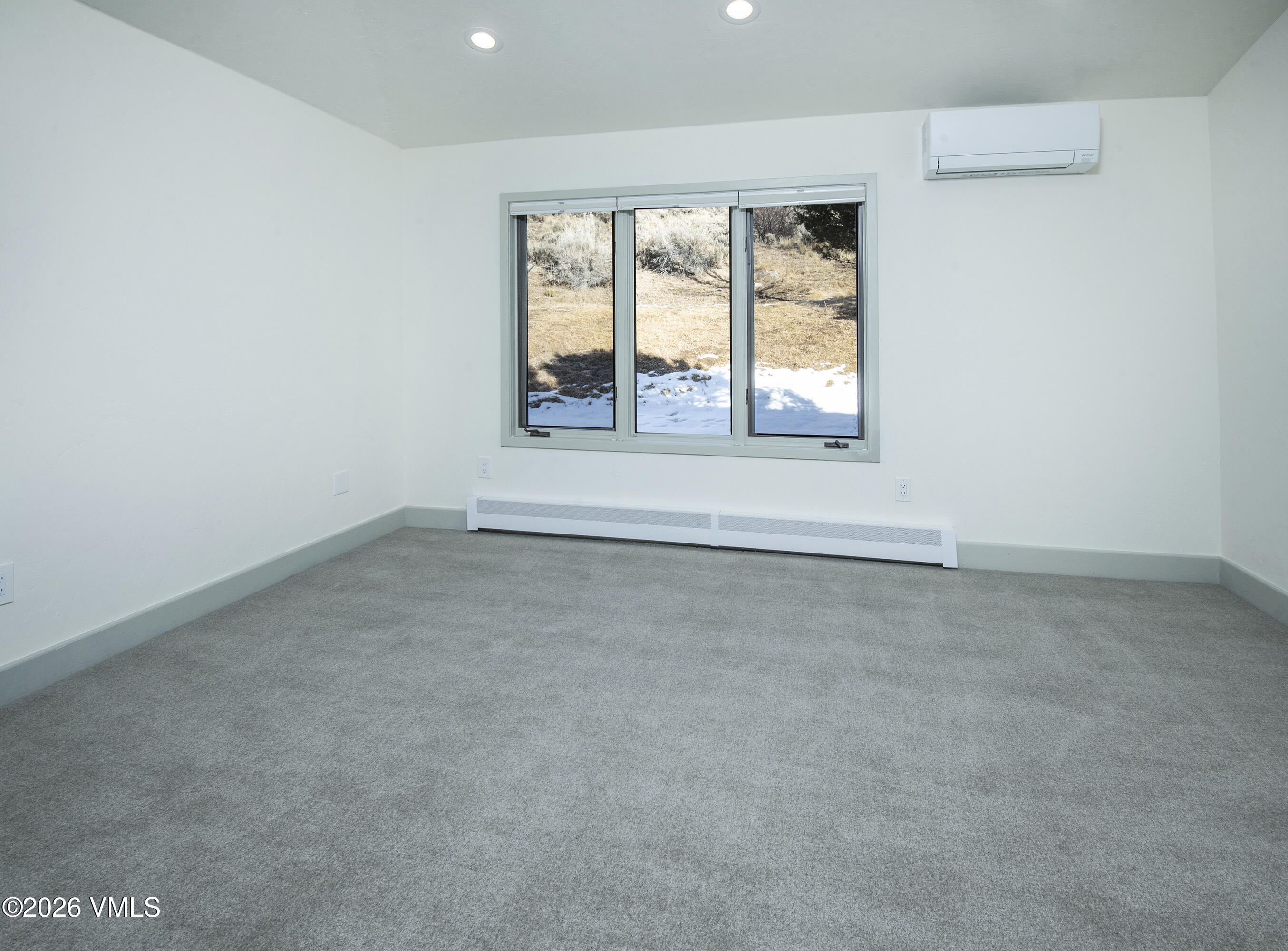 567 Singletree Road Edwards, CO 81632 - Photo 22 of 38 an empty room with a window