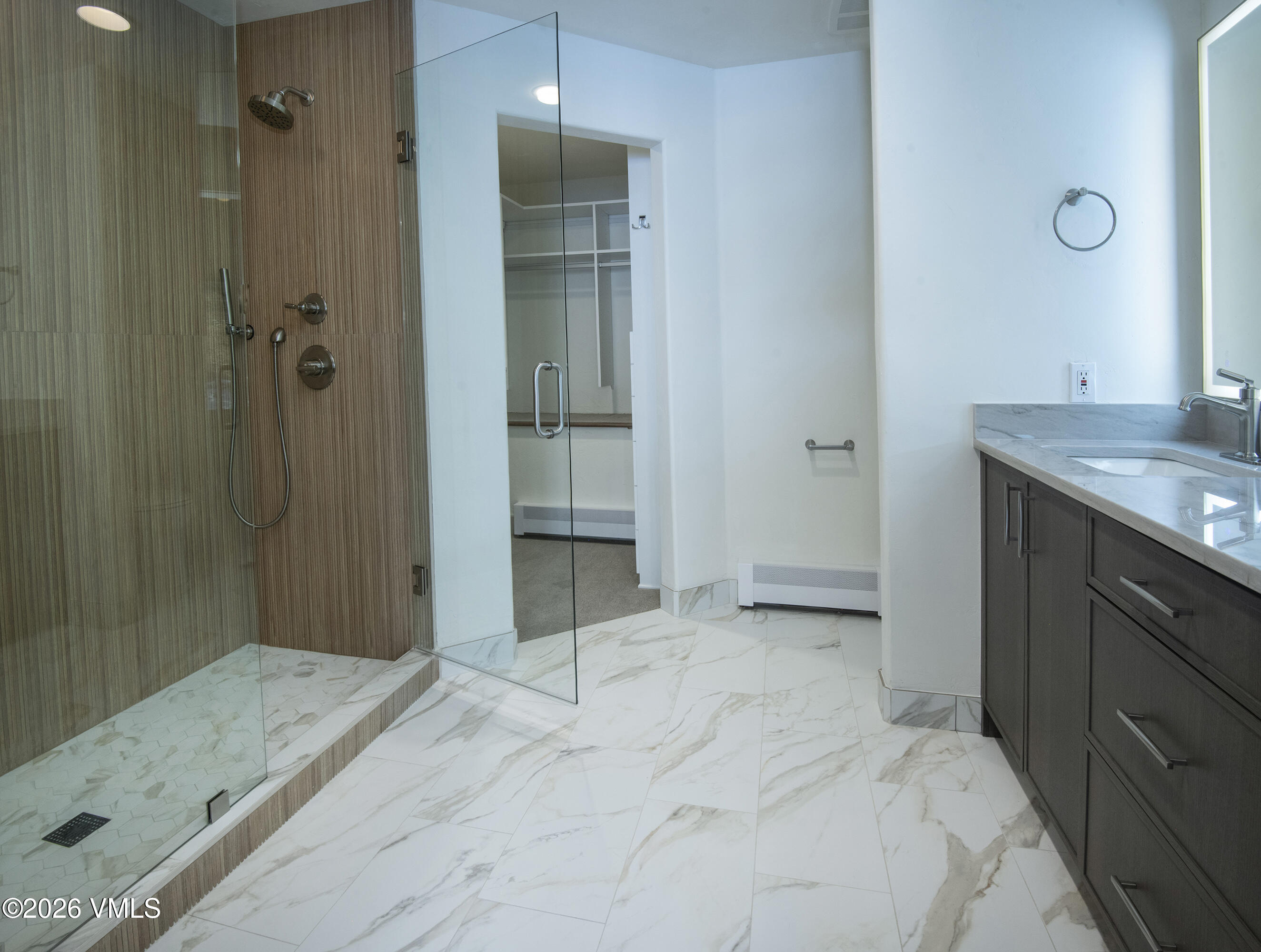 567 Singletree Road Edwards, CO 81632 - Photo 23 of 38 a bathroom with a granite countertop sink a shower and a mirror