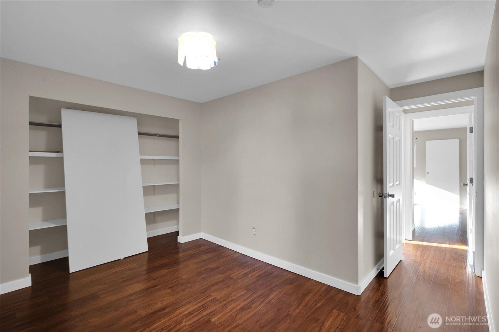 18518 131st Avenue Southeast Renton, WA 98058 - Photo 16 of 34 a view of empty room with wooden floor and window