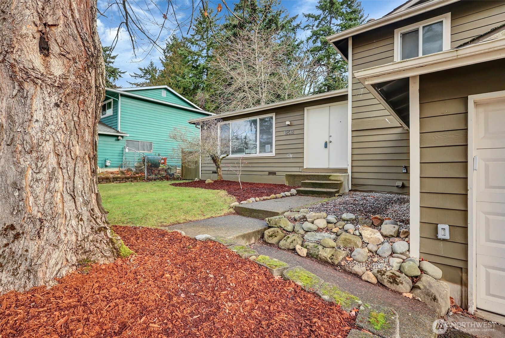 18518 131st Avenue Southeast Renton, WA 98058 - Photo 34 of 34 a view of a house with a yard