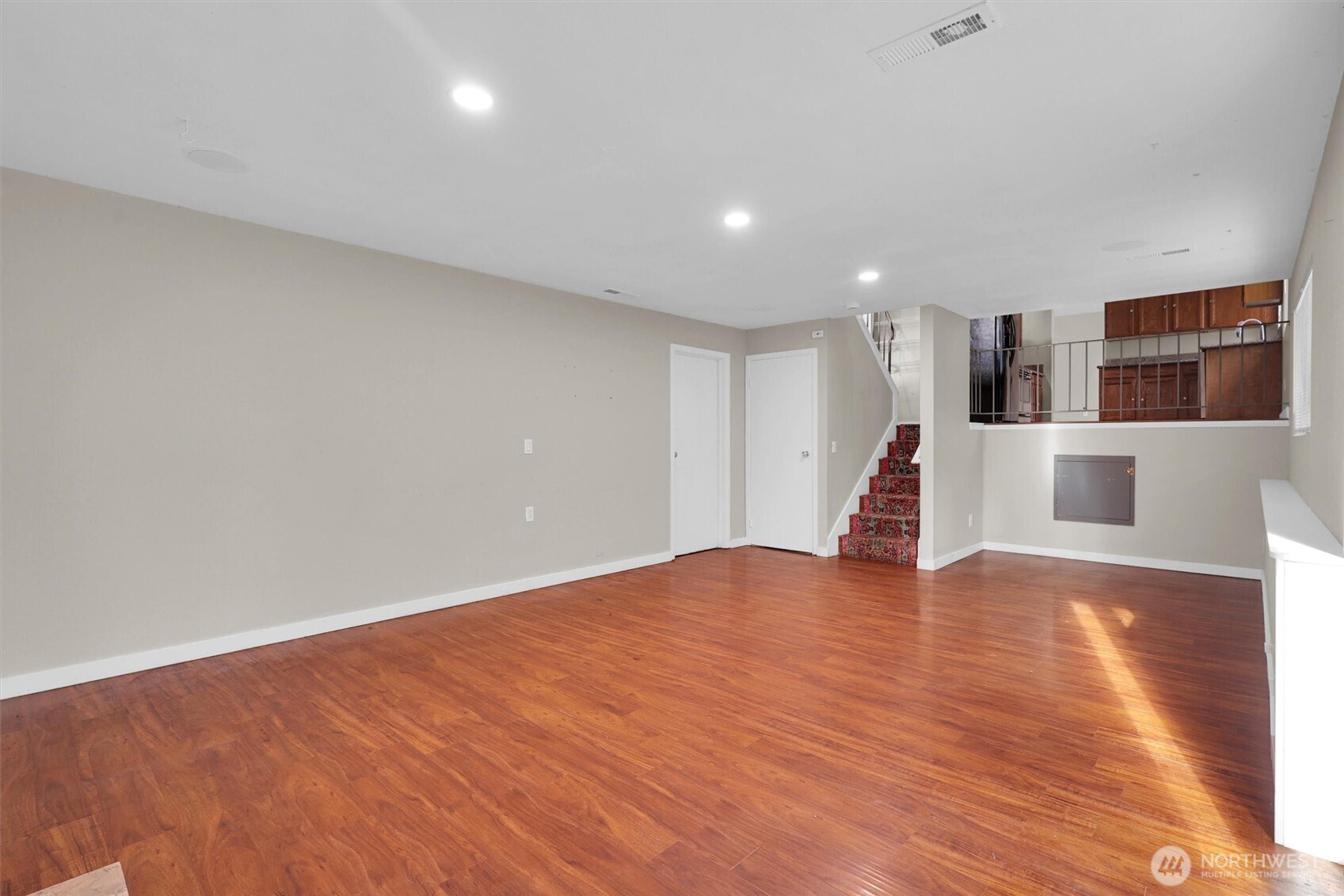 18518 131st Avenue Southeast Renton, WA 98058 - Photo 6 of 34 a view of empty room with wooden floor