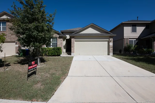 a view of a house with a and pathway