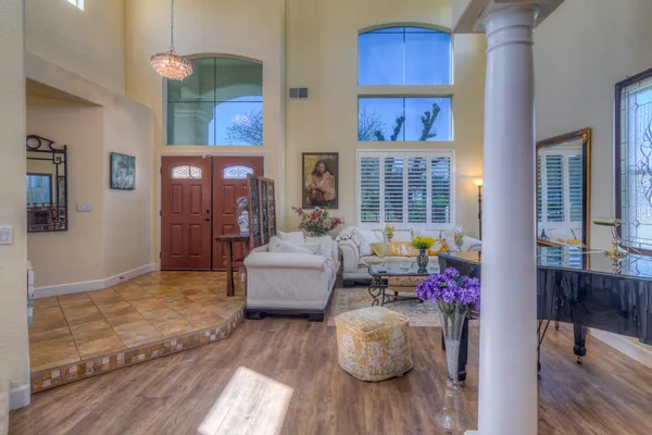 a bedroom with a bed and window