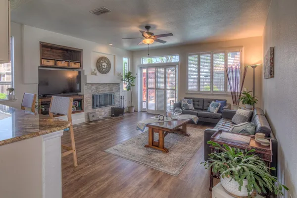 a view of a porch with wooden floor