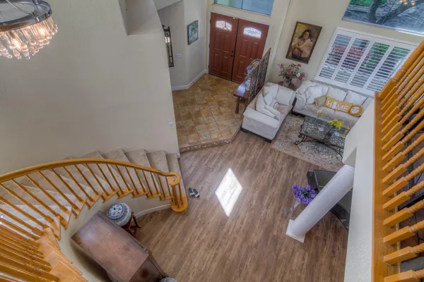 a bedroom with a bed and a desk