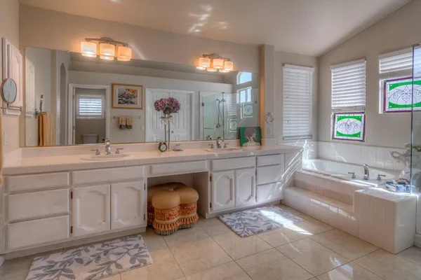 a view of a house with backyard and porch