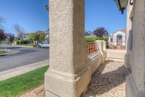 a view of entrance gate of a house