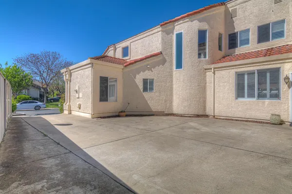a view of a house with a street