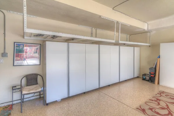 a view of a storage & utility room with furniture