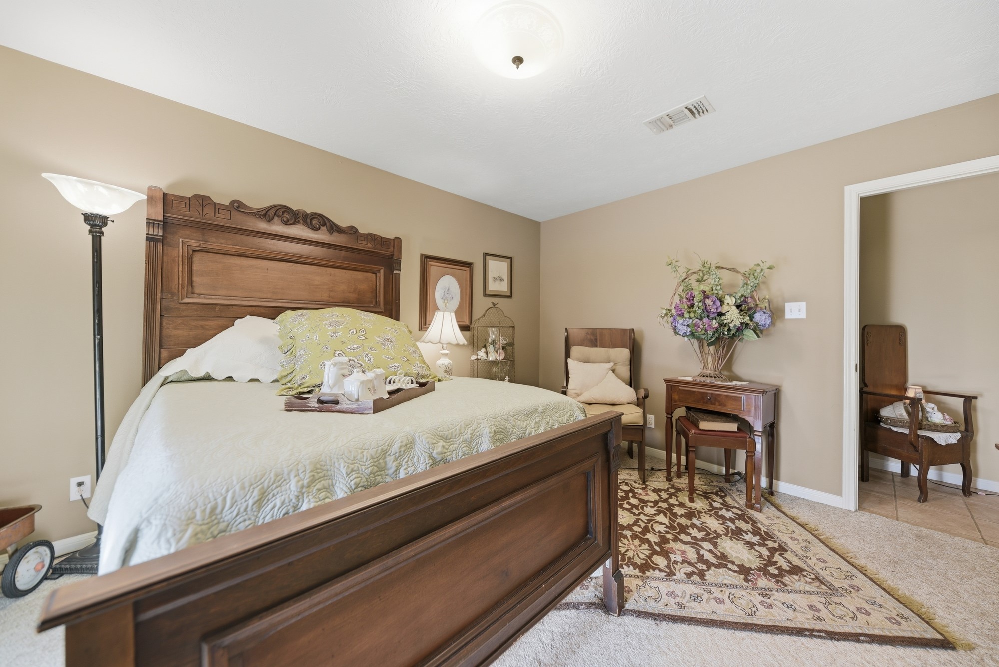 6950 Old Mill Creek Road Brenham, TX 77833 - Photo 33 of 40 a bedroom with a bed and table chair
