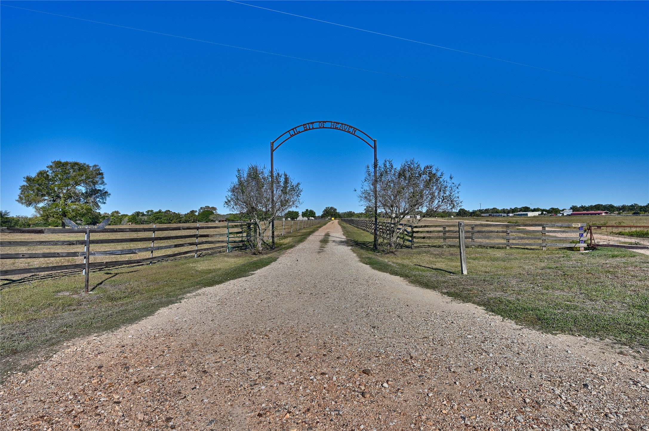 6950 Old Mill Creek Road Brenham, TX 77833 - Photo 8 of 40 a view of a road with a yard