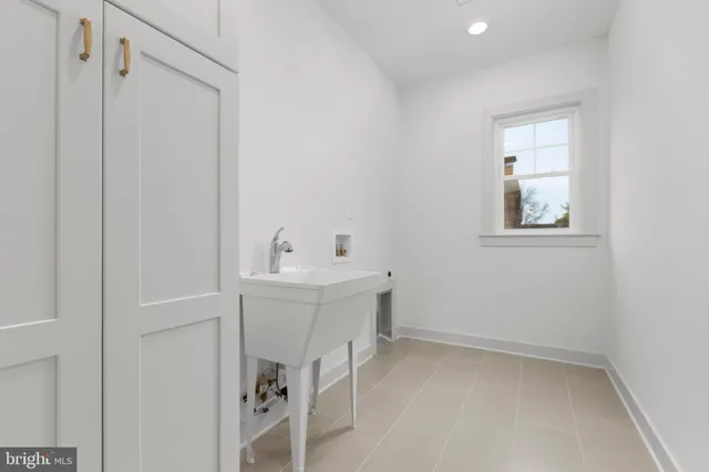 a bathroom with a sink a mirror and shower