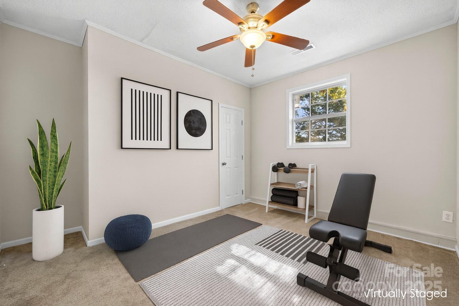 5613 Springs Road Conover, NC 28613 - Photo 15 of 23 a workspace with furniture and a potted plant