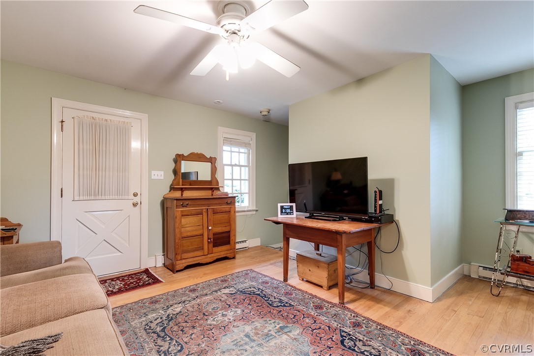13521 Kingsmill Road Midlothian, VA 23113 - Photo 22 of 50 a view of a workspace with furniture and a window