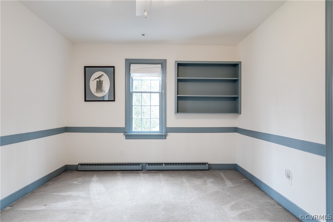 13521 Kingsmill Road Midlothian, VA 23113 - Photo 33 of 50 a view of an empty room with a window