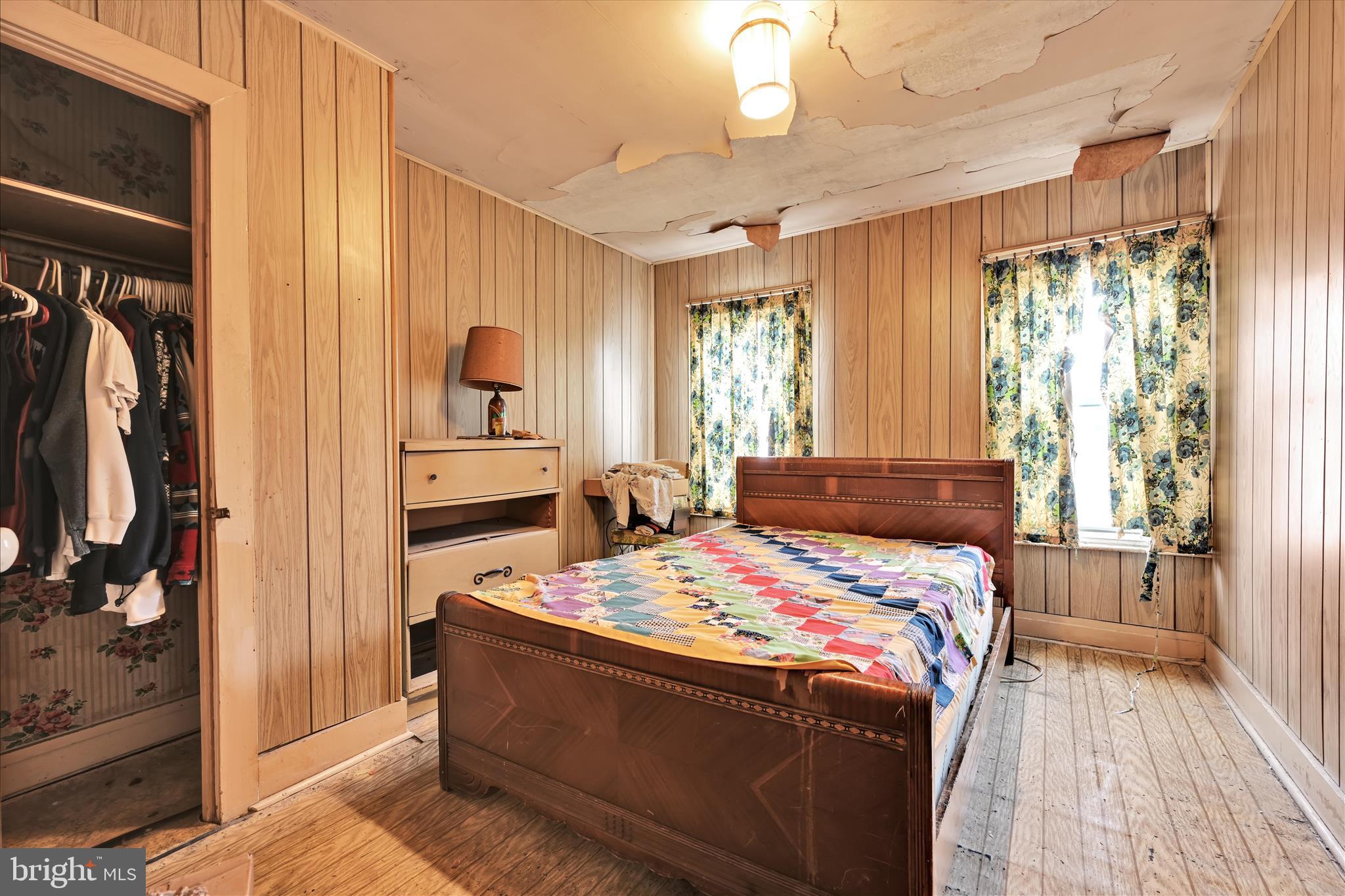 355 South 9th Street Lebanon, PA 17042 - Photo 18 of 29 a bedroom with a bed and a mirror