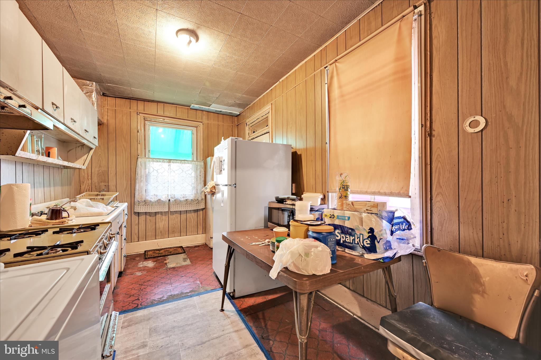 355 South 9th Street Lebanon, PA 17042 - Photo 10 of 29 a living room with furniture kitchen view and large windows