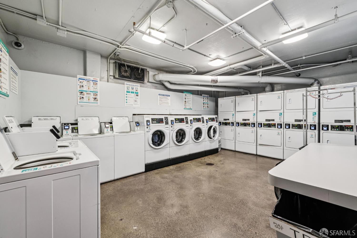 900 Bush Street, Unit 309 San Francisco, CA 94109 - Photo 17 of 25 a utility room with washer and dryer