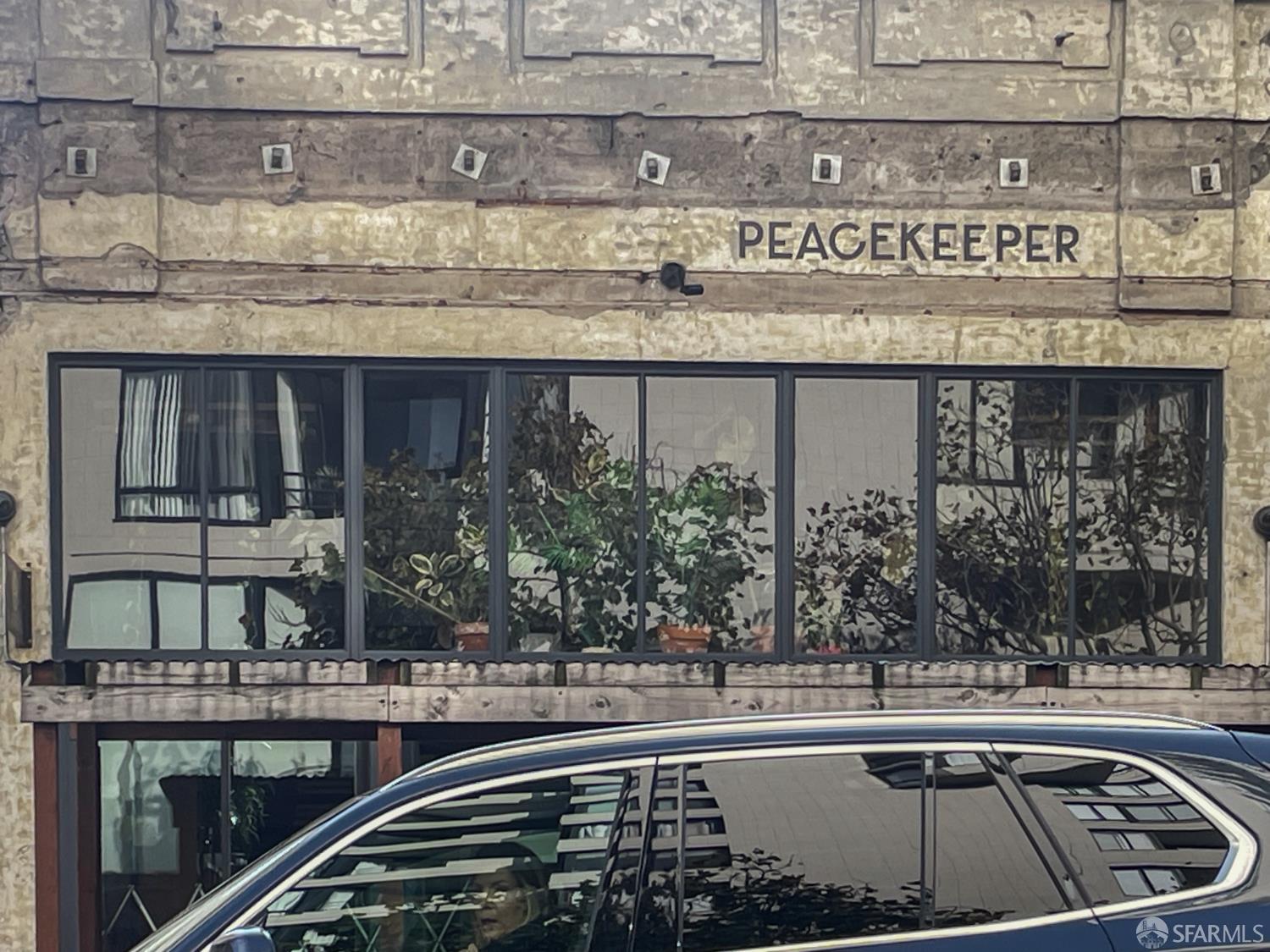 900 Bush Street, Unit 309 San Francisco, CA 94109 - Photo 20 of 25 a view of a kitchen with a stove and cabinets