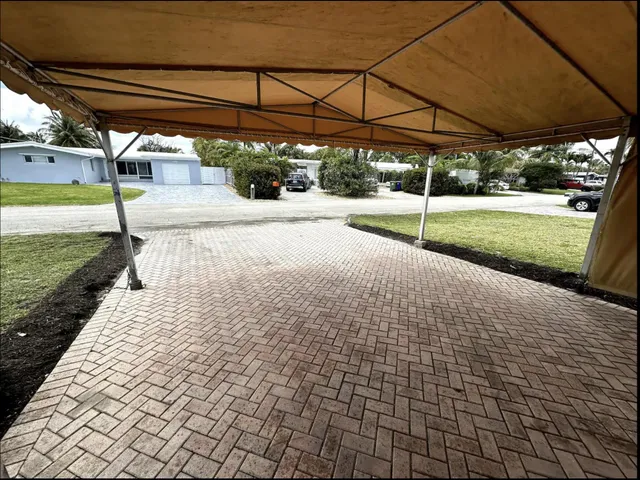 a hallway with a view of outdoor space