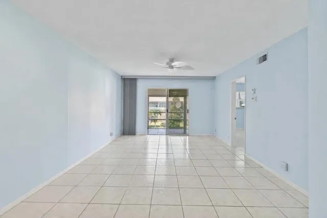 a view of a livingroom with furniture