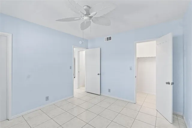 a view of a storage & utility room with a sink