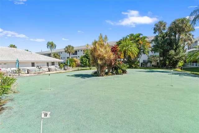 a view of entryway with stairs and wooden floor