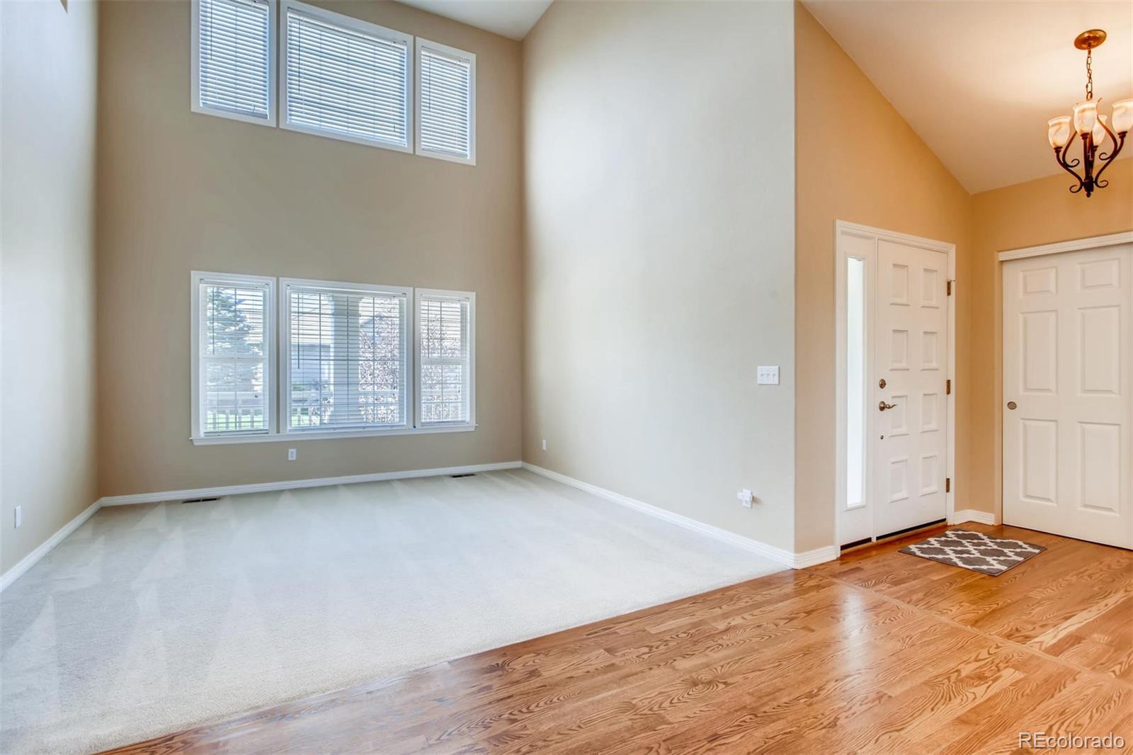 9535 East Aspen Hill Place Lone Tree, CO 80124 - Photo 5 of 28 an empty room with windows