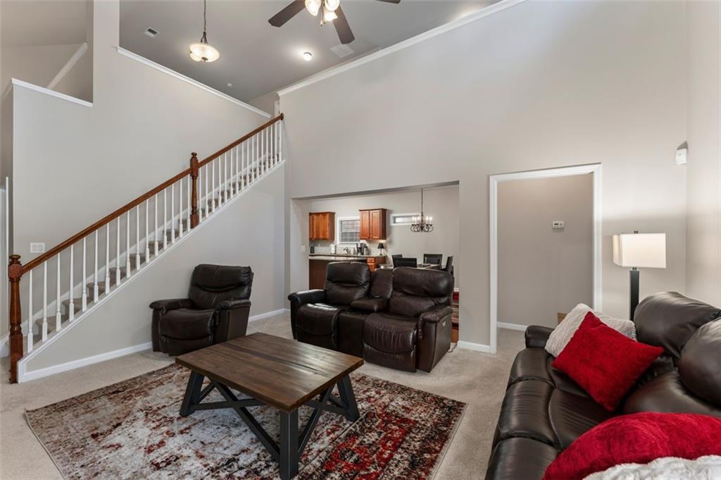 113 Tyson Woods Road Acworth, GA 30102 - Photo 7 of 37 a living room with furniture rug and wooden floor