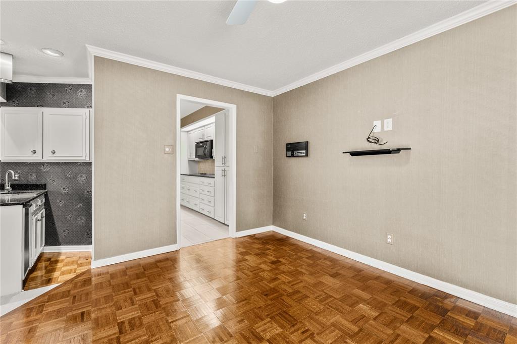 3901 Old Mill Road Waco, TX 76710 - Photo 12 of 40 a bedroom with a bed and cabinets