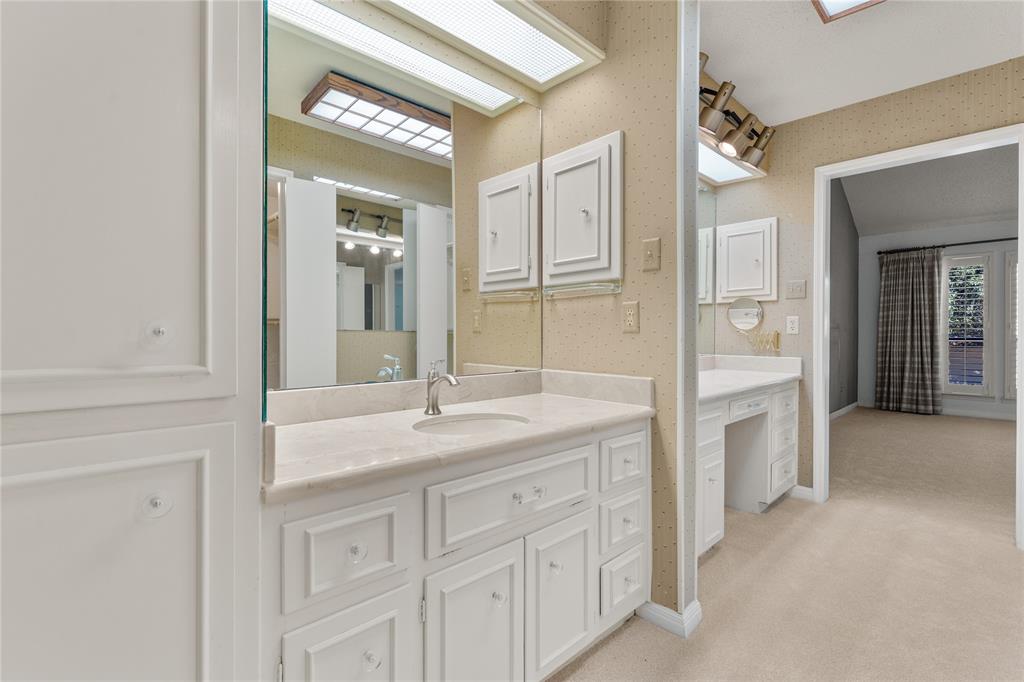 3901 Old Mill Road Waco, TX 76710 - Photo 22 of 40 a bathroom with a granite countertop sink mirror and
